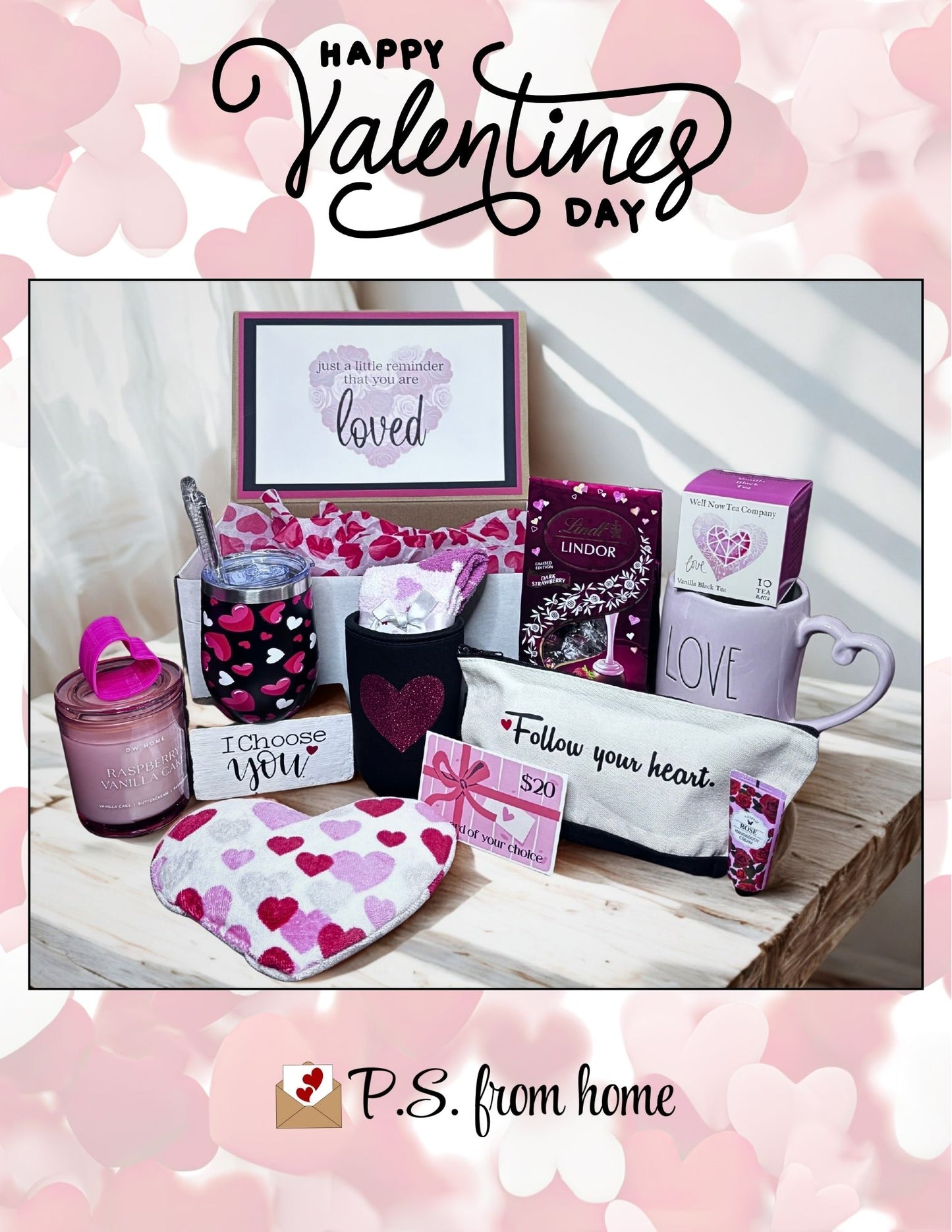 Valentine's Day gift set with pink and purple items on a wooden surface, surrounded by heart-shaped decorations.