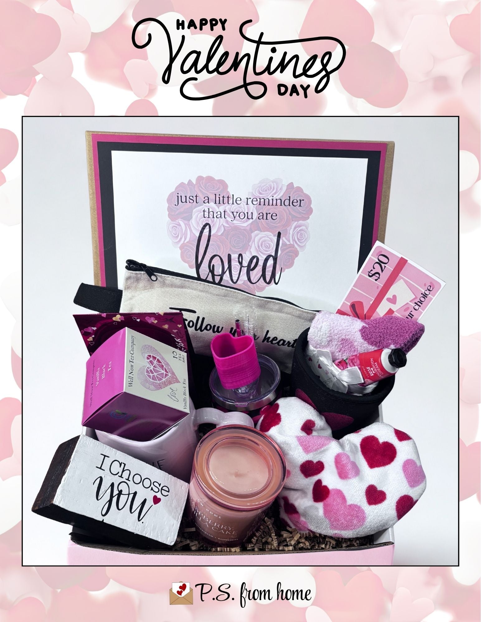 Valentine's Day gift set with cards and small items on a pink heart patterned background.