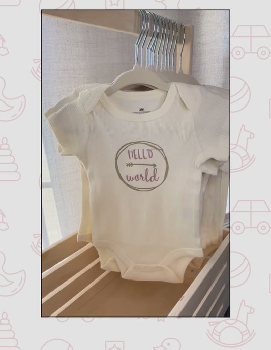 video showing each onesie on a hanger